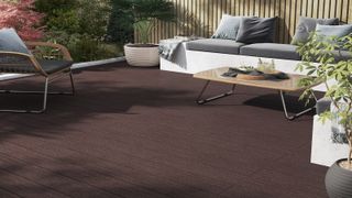 Brown composite decking with garden furniture