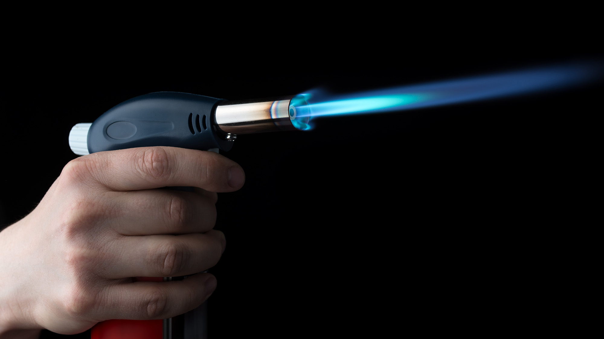 Blow torch in use