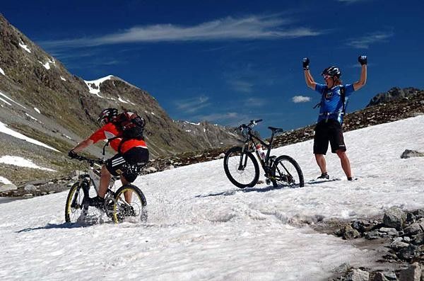 Hitting the snow... which was almost impossible to ride through