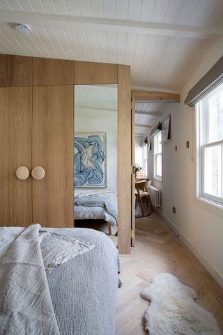a bedroom in a small studio apartment
