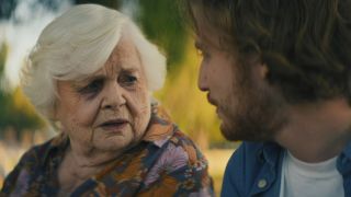 June Squibb and Fred Hechinger looking at each other in Thelma. 