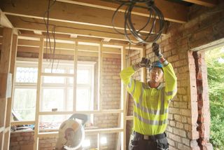 local electrician working on building project