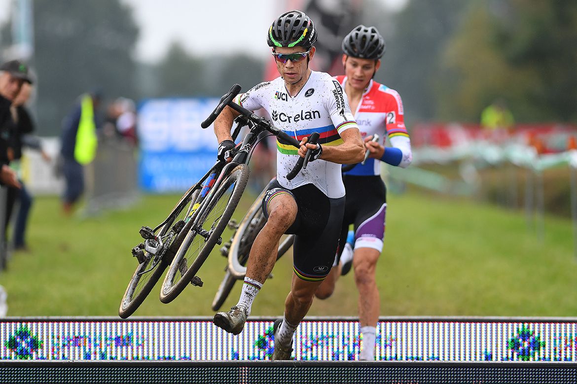 Wout Van Aert (Crelan-Vastgoedservice) leads over the barriers