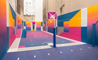 It is a colorful basketball court