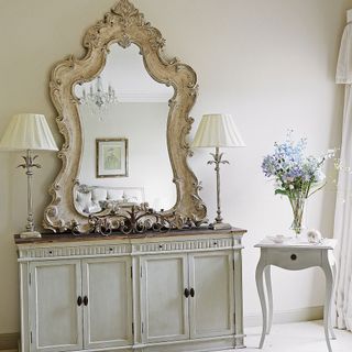 dressing room with mirror and drawers