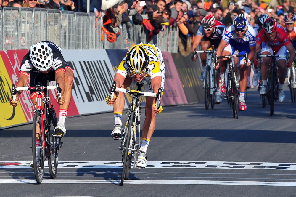 Mark Cavendish (Team Columbia) crosses the finish line to win the 100th Milano-San Remo ahead of German Heinrich Haussler