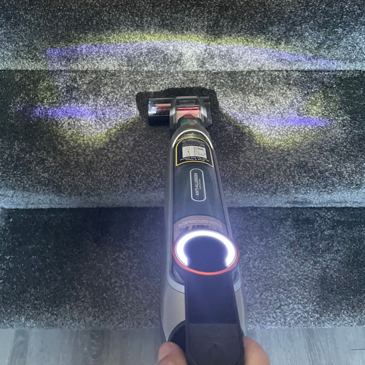 Using the Shark PowerDetect Transformer Corded Upright Vacuum Cleaner to vacuum grey carpets