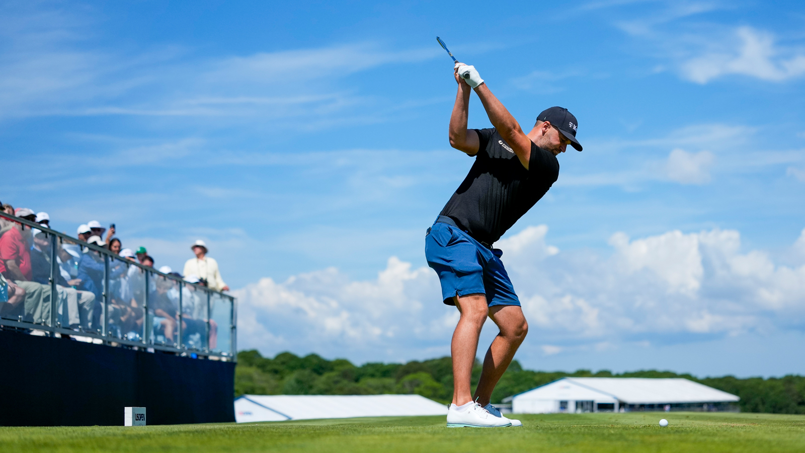 Wyndham Clark at the top of his backswing 