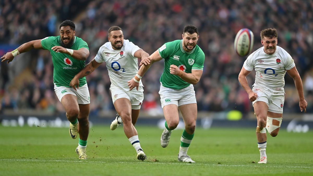 Two Ireland and two England players chase the ball during a 2024 Six Nations rugby game