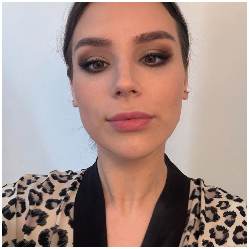 girl with a smokey matte brown eye in a cheetah robe