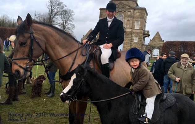 Young Arthur enjoys his day with the Duke of Beaufort's where a huge crowd in excess of 6,000 gathered at Worcester Lodge, Didmarton