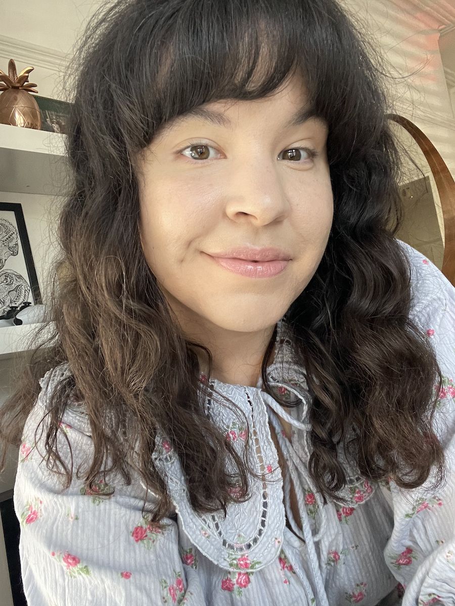 Micah Ricketts wearing Fenty Beauty Ease Drop Blurring Skin Tint