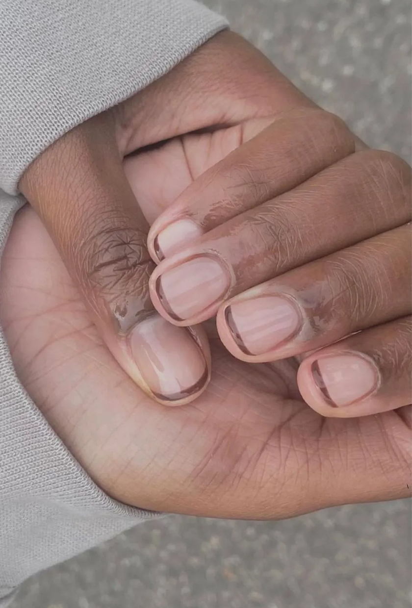 Brown French manicure on short nails