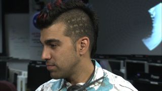 Bobak Ferdowsi, a flight controller for NASA's Curiosity Mars rover, recently updated his famous mohawk hairdo to include the Morse Code letters for "JPL" in homage to NASA's Jet Propulsion Laboratory in California, where he works. These Morse Code symbols are also emblazoned on the Curiosity rover's wheels to help researchers track the rover's speed by the indentations it leaves in Martian dirt.