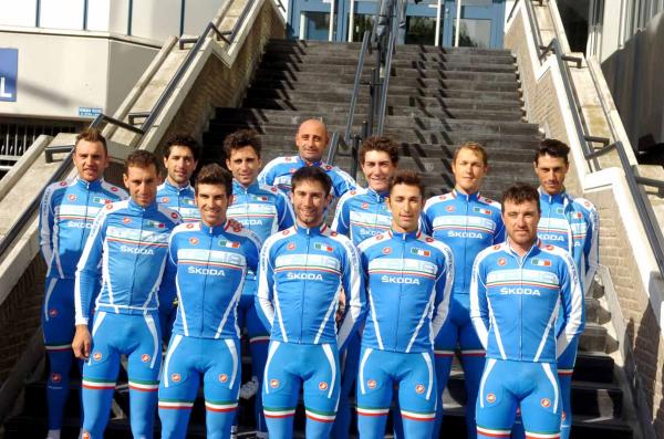 Italy's Olympic champion Paolo Bettini, left, looks at his