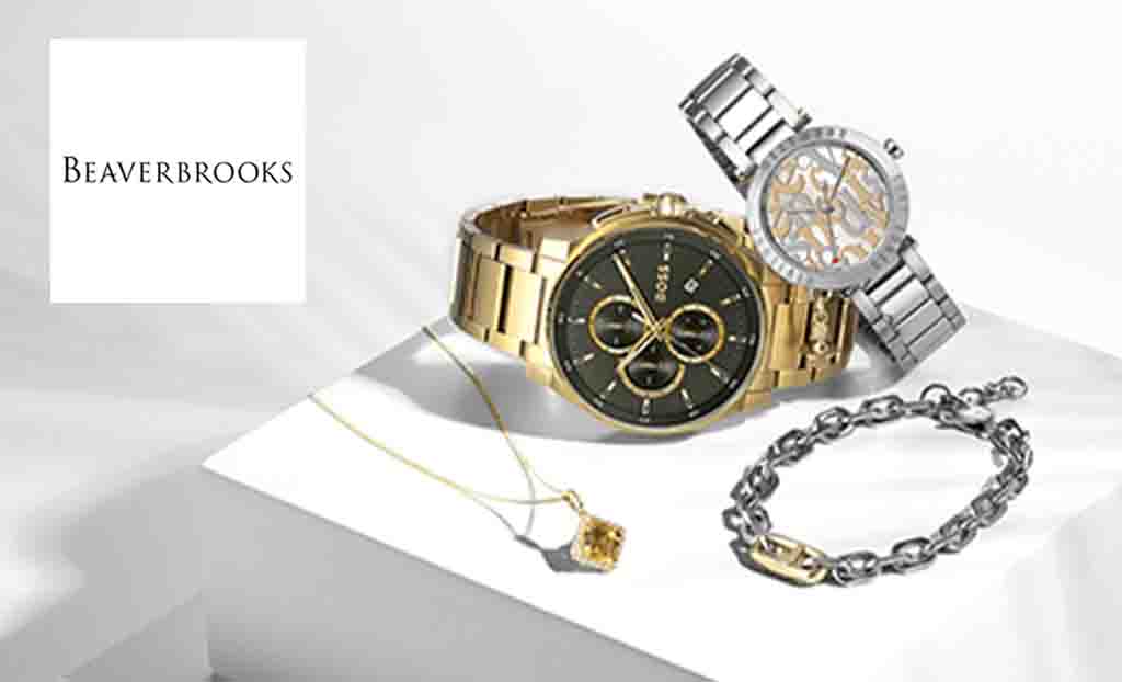 Beaverbrooks logo placed on top of gold and silver watche and jewellery 