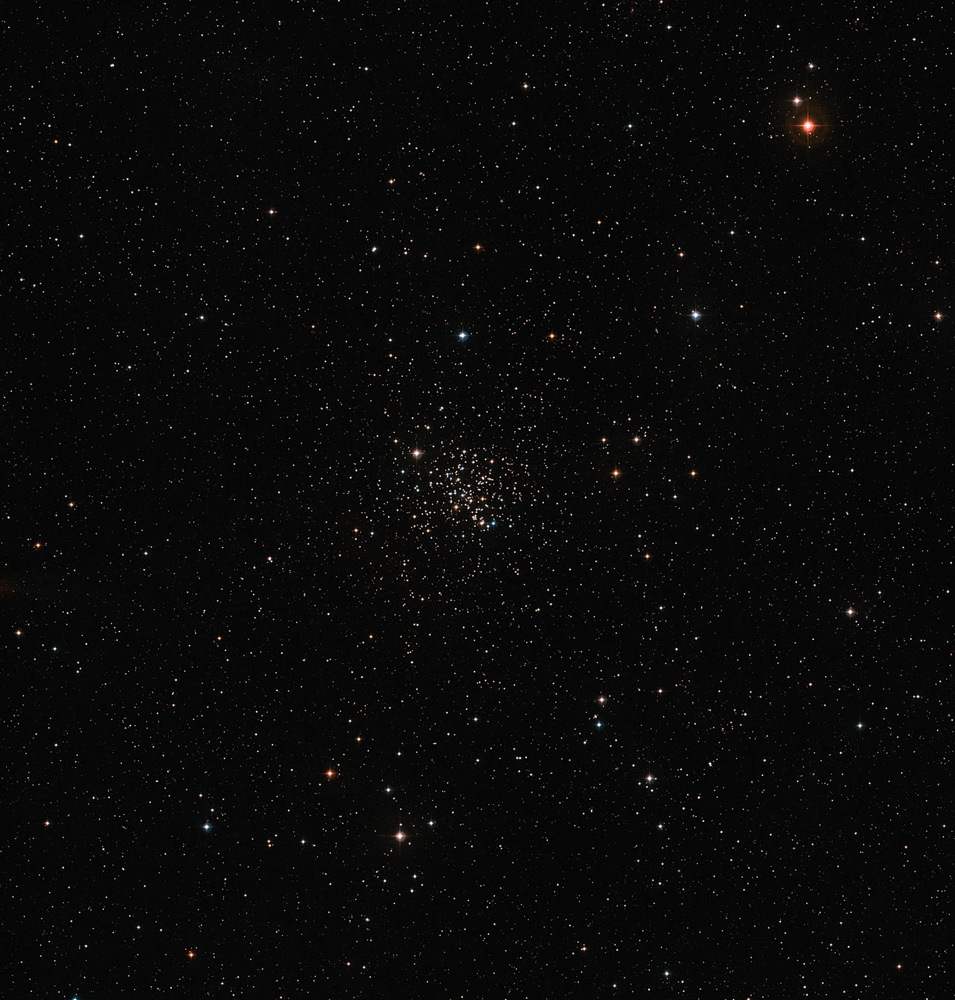 The Messier 67 star cluster shines in the center of this image. The star cluster plays host to about 500 stars that are all around the same age and composition as the sun. Image released Jan. 15, 2014.