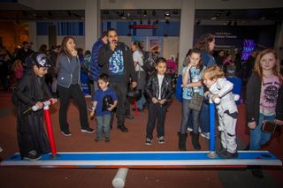 Liberty Science Center visitors bring balance to the Force at "Science, Sabers & Star Wars."