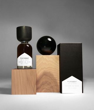 Black cosmetics on wooden blocks