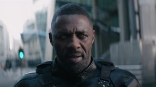 Idris Elba with gold eyes in Hobbs and Shaw.