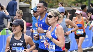NEW YORK, NEW YORK - NOVEMBER 06: TJ Holmes and Amy Robach run during the 2022 TCS New York City Marathon on November 06, 2022 in New York City.