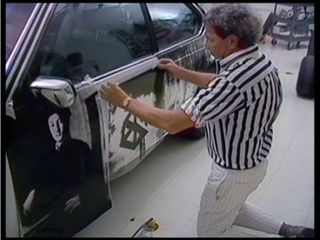 Robert Rauschenberg working on BMW Art Car #6, 1986