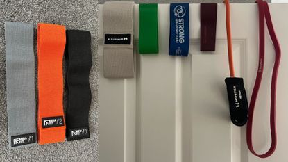 A selection of resistance bands resting on carpet and hung over a door frame to show the best resistance bands tested for this round-up