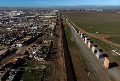  Trump's border wall prototypes as seen from Tijuana.