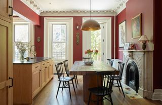 A red and wood dining room