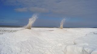 So-called ice volcanoes erupting on Oval Beach in Michigan