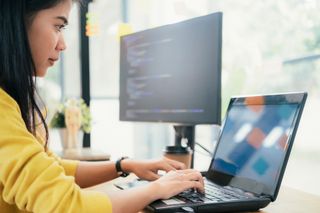 Lady sitting at a laptop