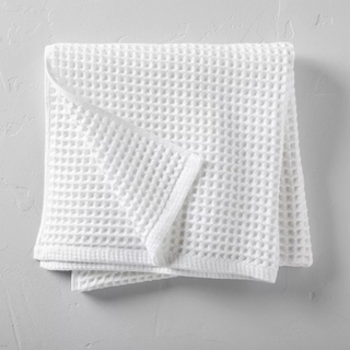 A white waffle texture bath towel