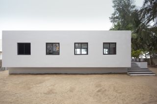 Minimalist exterior of white retreat in Nigeria