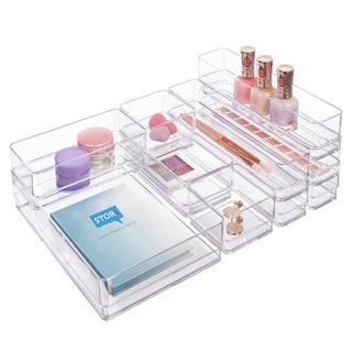 A set of 10 clear acrylic drawer dividers