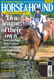 cover of Horse & Hound featuring Ros Canter and Lordships Graffalo jumping into a lake at Badminton