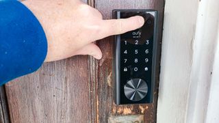 Eufy Security Smart Lock being opened using fingerprint sensor