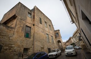 VALLETTA, MALTA - NOVEMBER 26: The exterior of Villa Guardamangia is seen on November 26, 2015 in Valletta, Malta. The villa on the outskirts of Valletta and which has fallen into disrepair, is the only house outside the UK that a British monarch has resided in. The Queen lived at the property when her husband, The Duke of Edinburgh was stationed in Malta as a serving Royal Navy officer. (Photo by Matt Cardy/Getty Images)