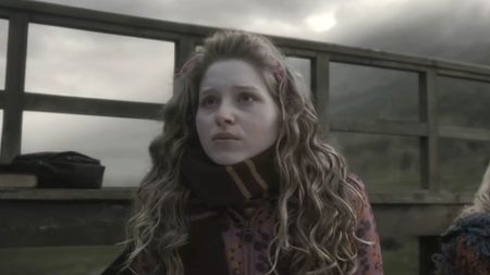 Lavender Brown watching Ron's Quidditch try-outs.