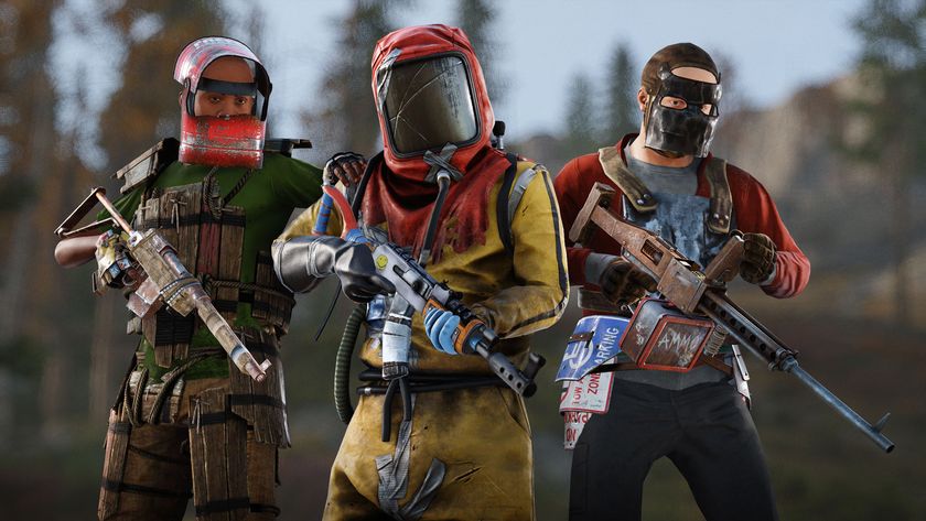 Three Rust players all holding automatic weapons with pieced-together, falling apart armor