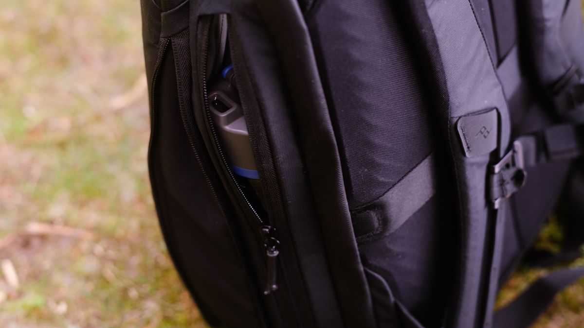 The Peak Design Travel Backpack 20L in use by a photographer