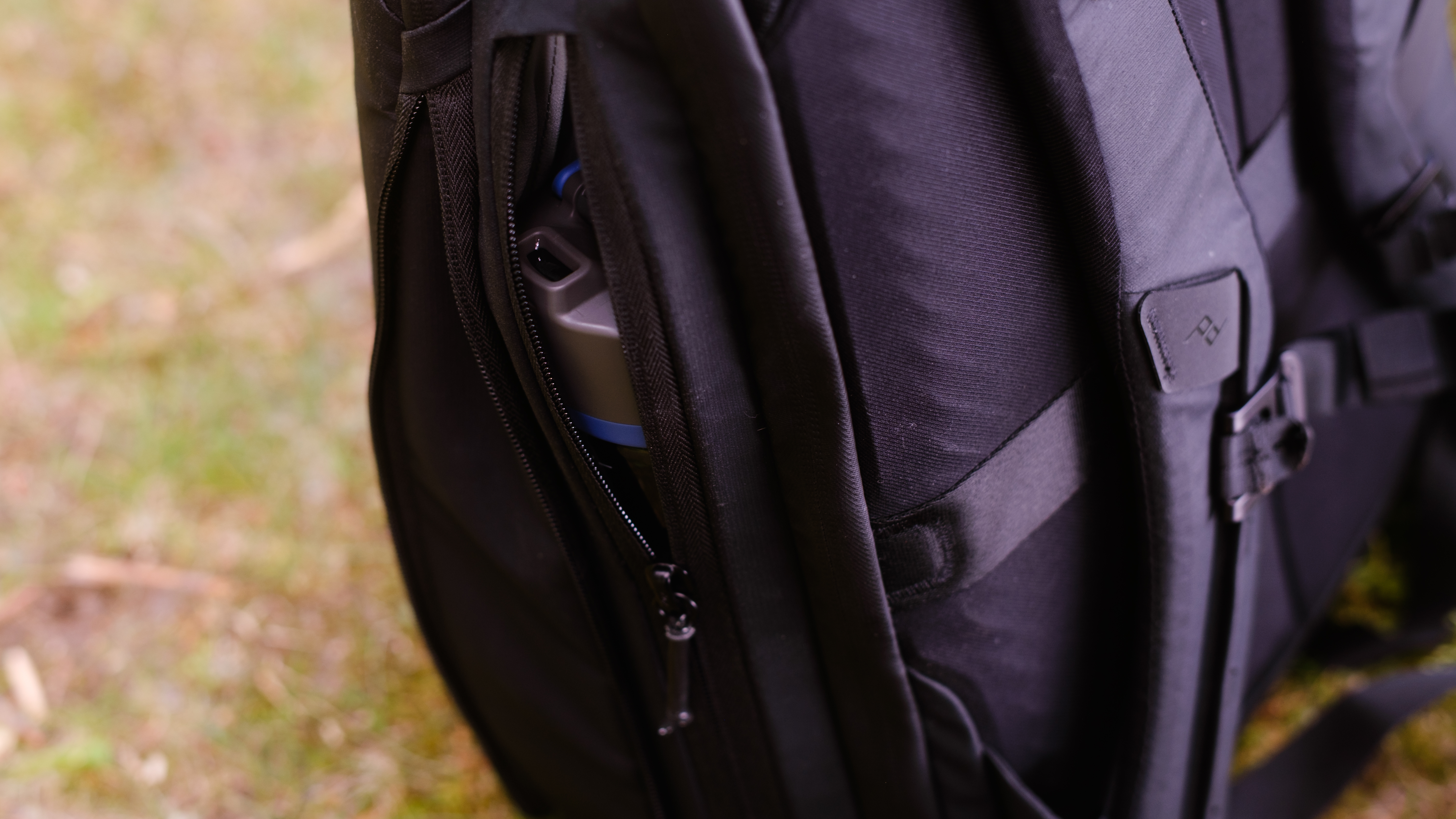 The Peak Design Travel Backpack 20L in use by a photographer