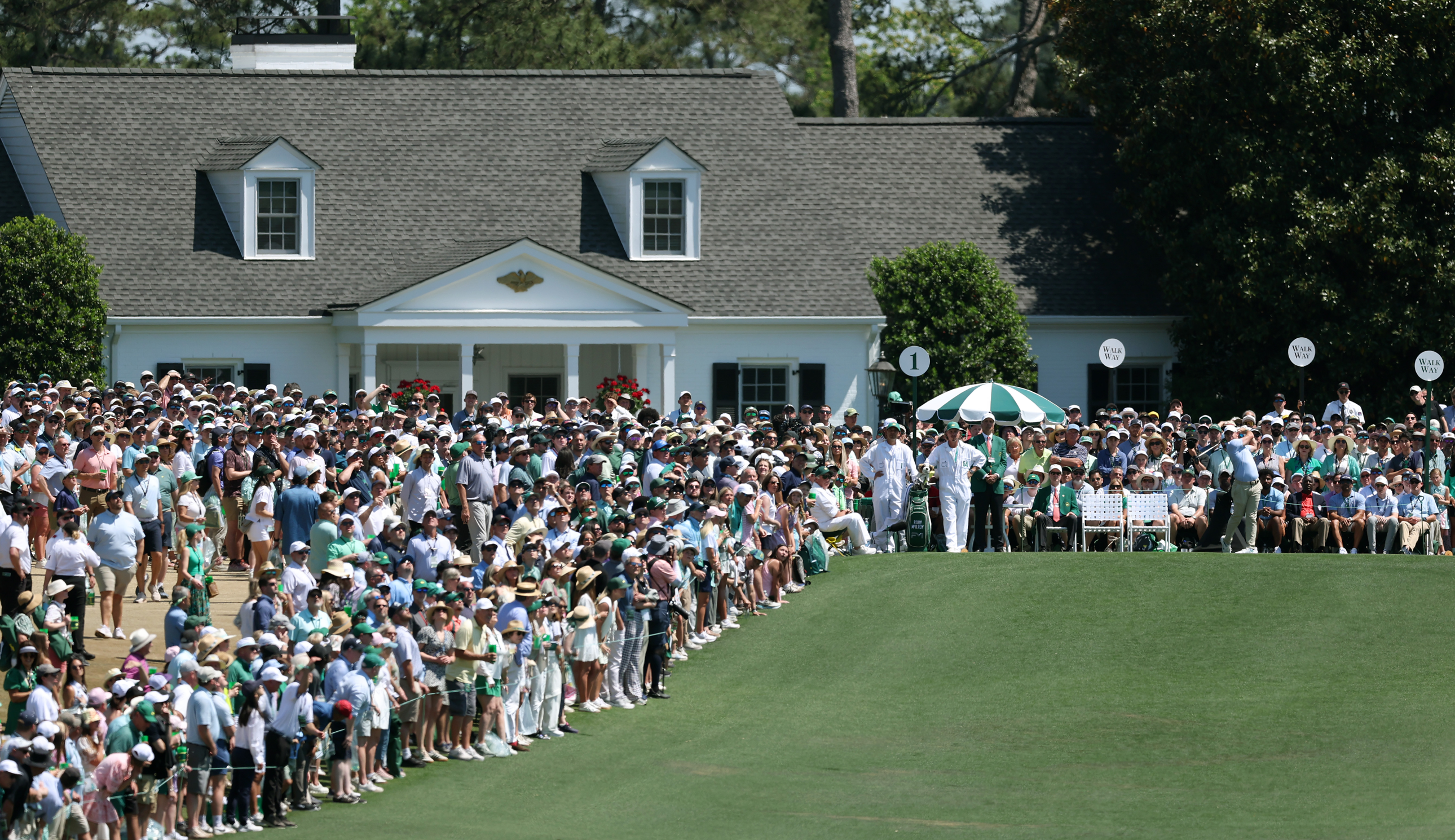 Rory McIlroy hits a tee shot off the first of Augusta National