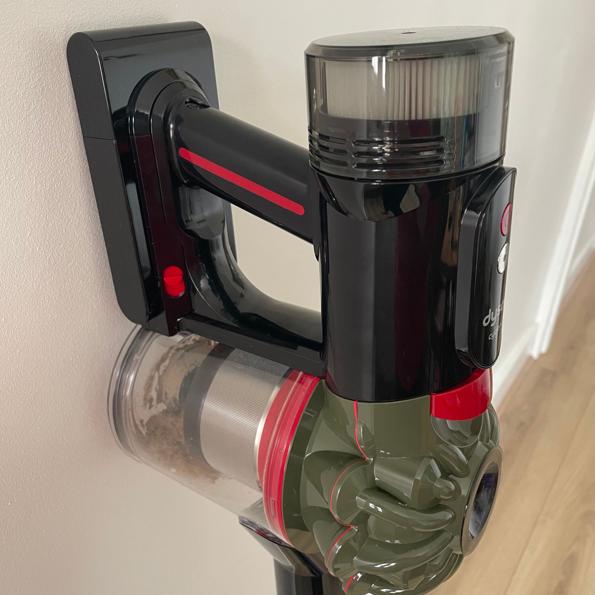 Close up of the filter, dust canister and swappable battery of the Dyson V8 Cyclone