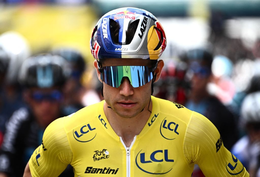 JumboVisma teams Belgian rider Wout Van Aert wearing the overall leaders yellow jersey awaits the start of the 5th stage of the 109th edition of the Tour de France cycling race 1537 km between Lille and Arenberg Porte du Hainaut in northern France on July 6 2022 Photo by Marco BERTORELLO AFP Photo by MARCO BERTORELLOAFP via Getty Images