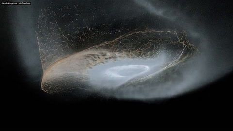 the aftermath of a cosmic collision of two moons simulated 