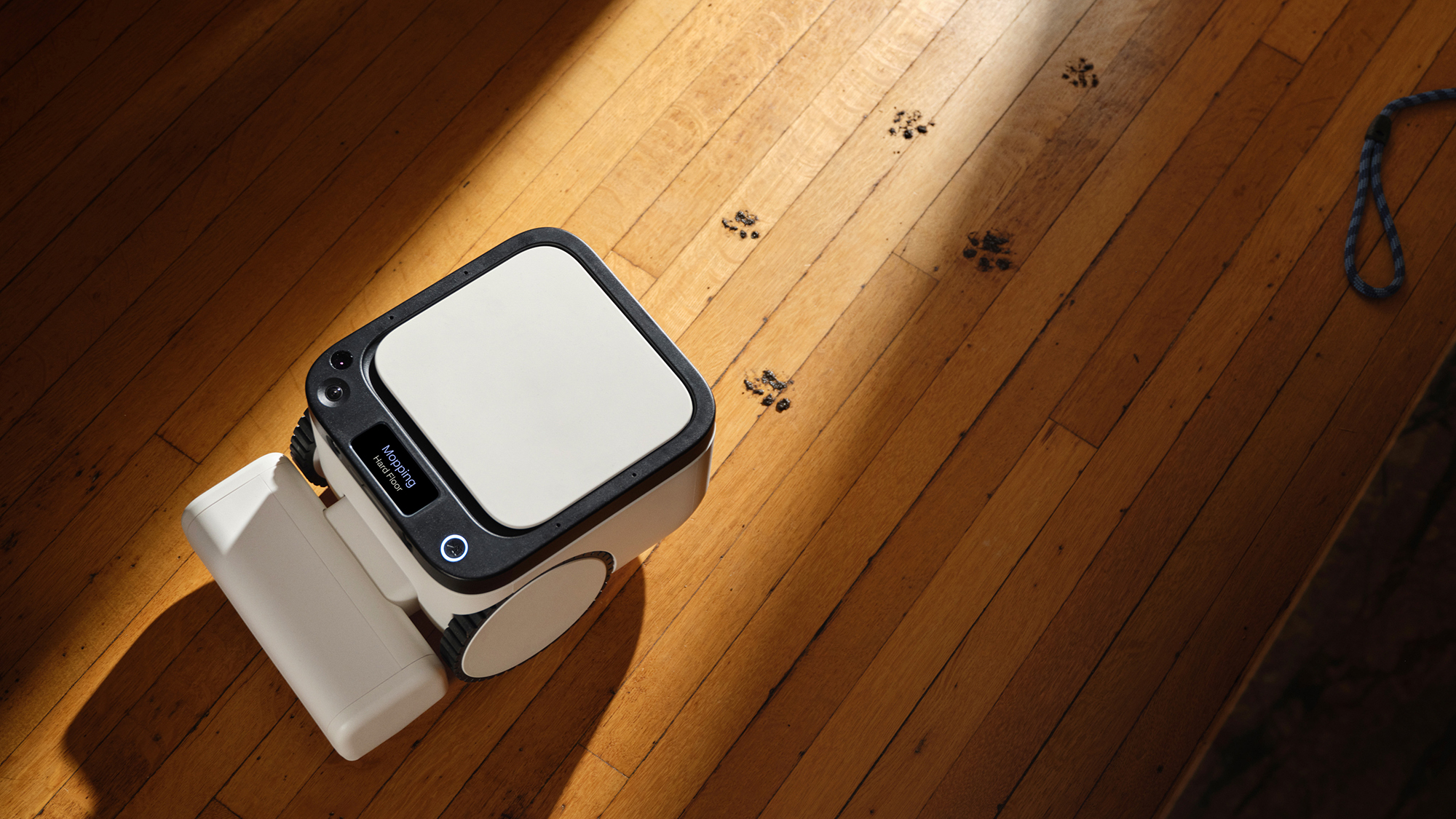 The Matic robot vacuum on a wooden floor