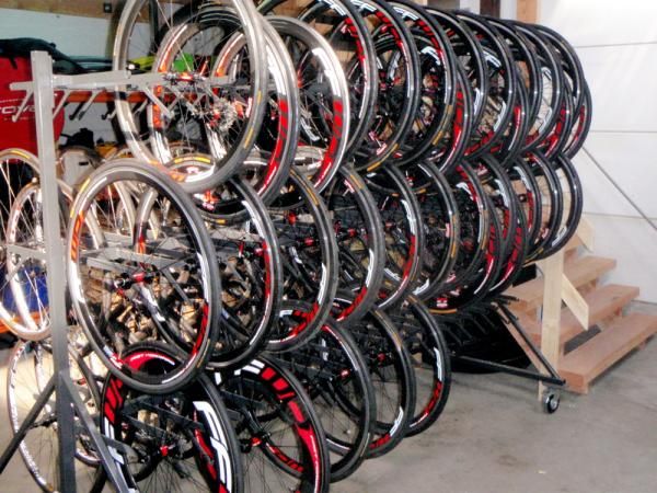 Wheels are racked with tyres fitted and ready to go.