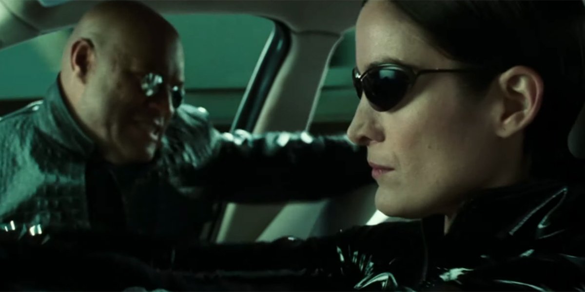 Trinity driving while Morpheus fights the ghost in The Matrix Reloaded