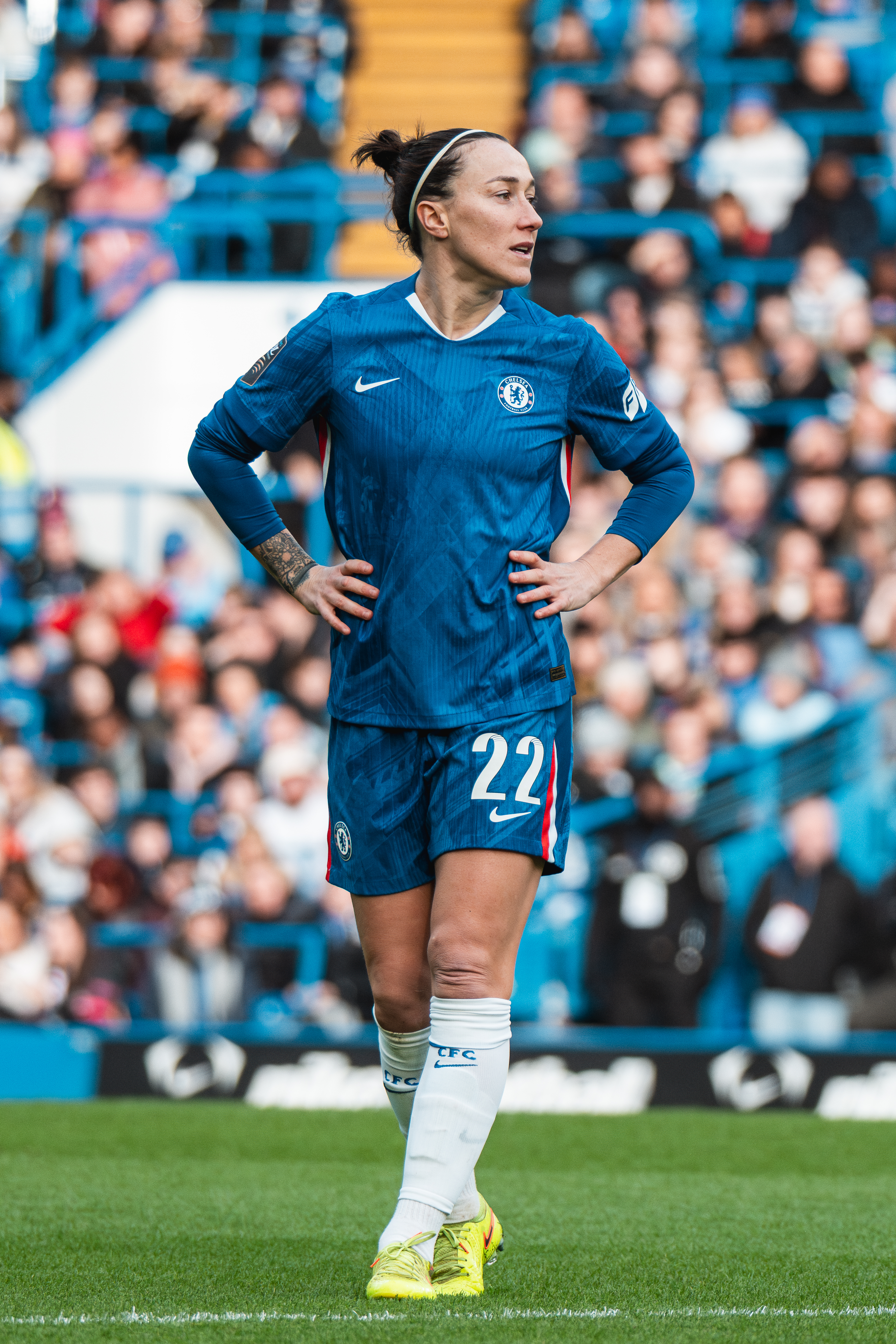 Lucy Bronze standing on the field at a match between Chelsea and Arsenal at Stamford Bridge in London, England, on January 24, 2026.