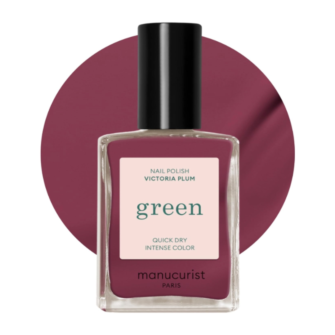 A product shot of the Manucurist Green Nail Polish in Shade Victoria Plum, with a swatch of the muted, purple-plum colour and on a white background